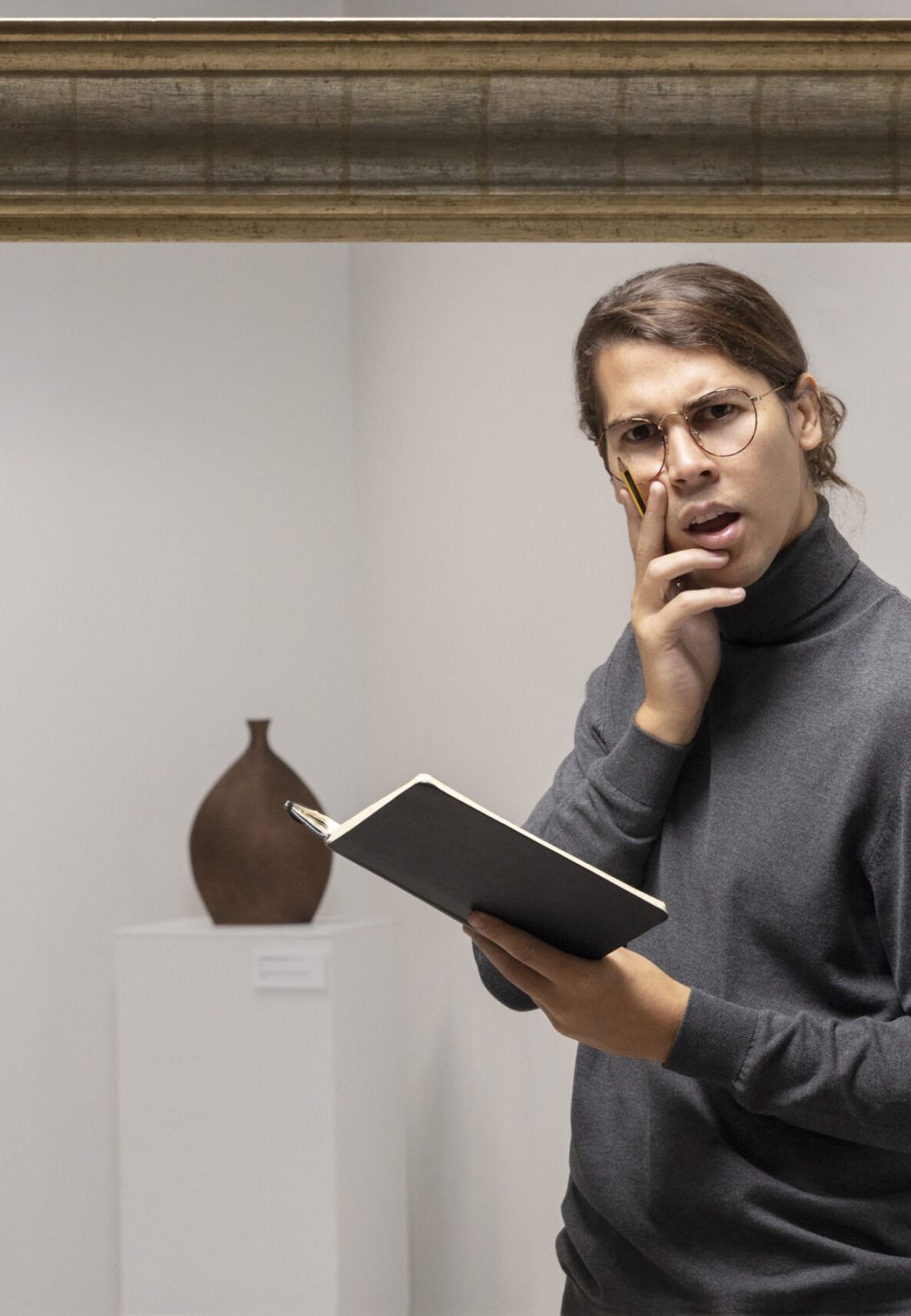 young-man-going-art-gallery